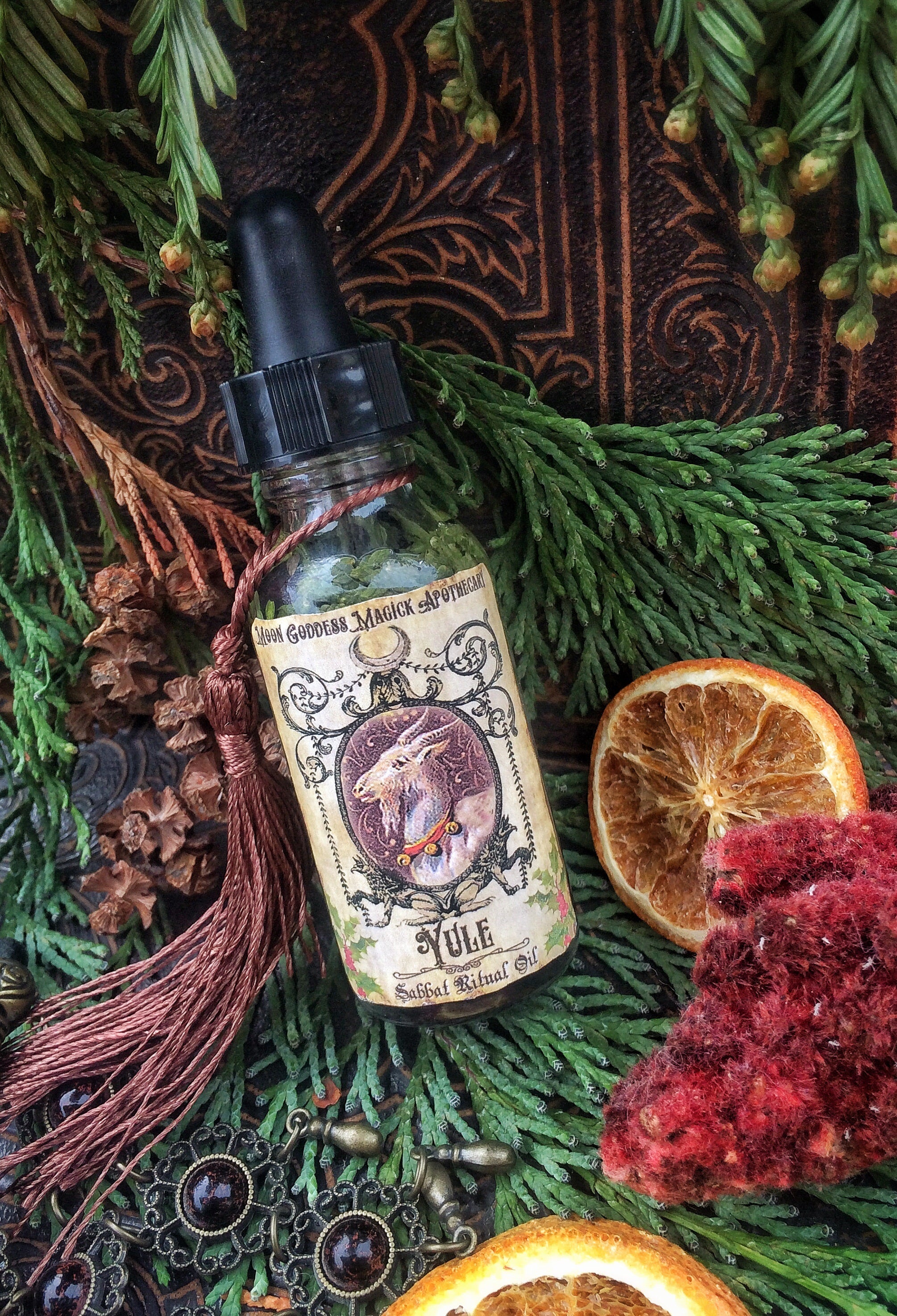 YULE OIL ~ Sacred Sabbat Oil ~ Winter Solstice~1oz bottle w/ Dropper~ Crystal Charged with Garnet~ Yule Oil ~ Ritual Oil ~ Witchcraft~ Pagan - Moon Goddess Magick Apothecary 